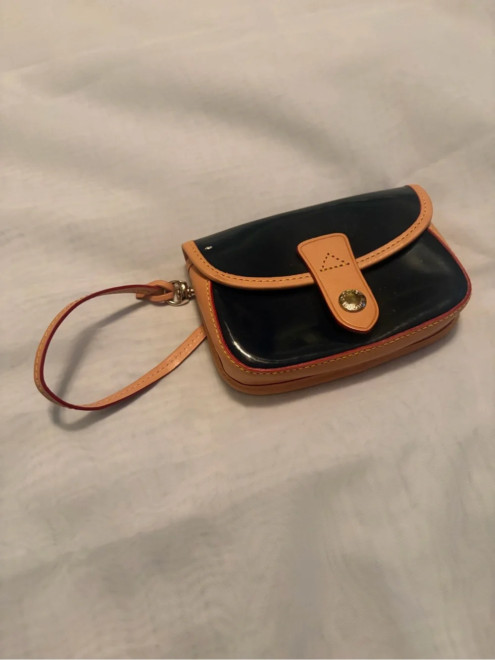 Dooney and Bourke Navy and Tan Patent Wristlet